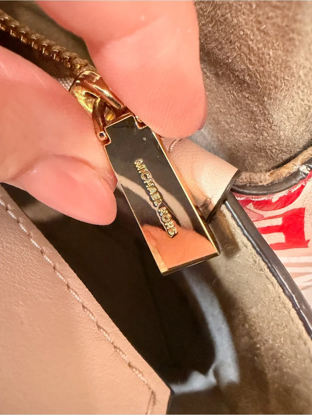 Michael Kors corner marks gently